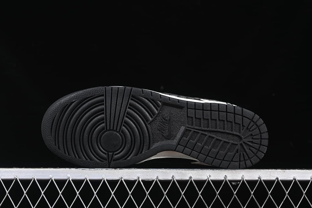 Underside view of the black rubber outsole tread