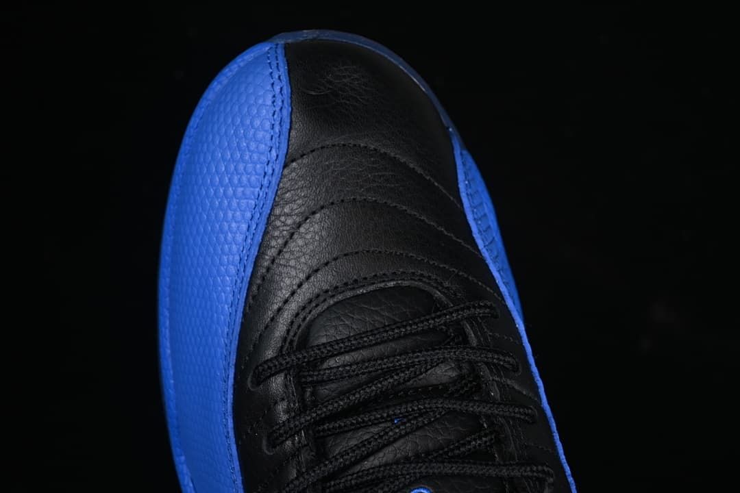 Top view of the black lacing and blue textured side panels