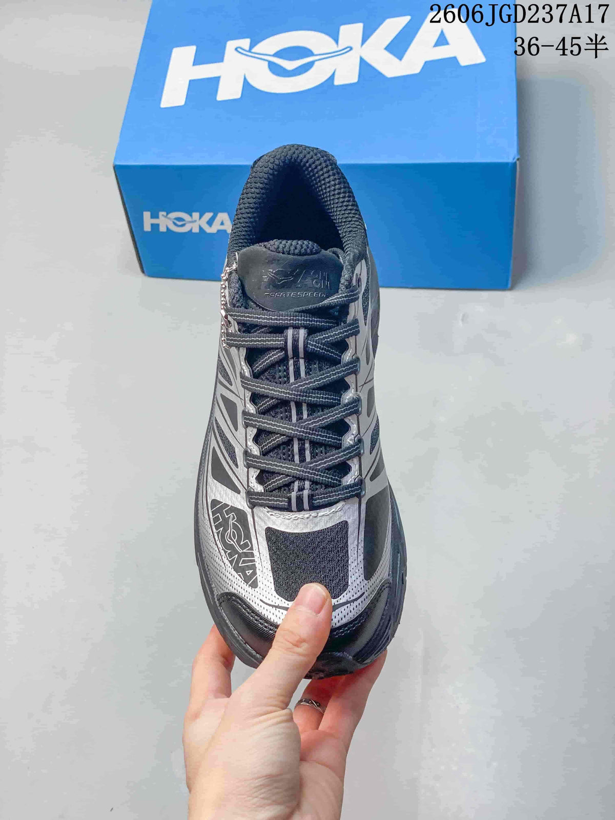 Top view of the laces and patterned upper on a HOKA trail shoe