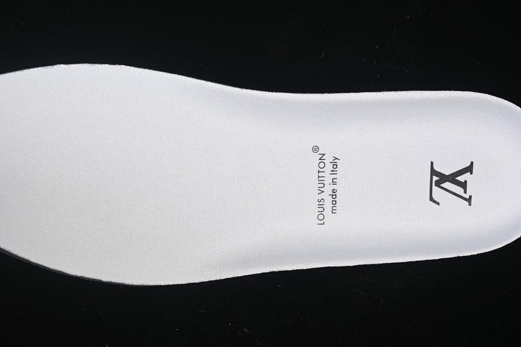 White insole printed with Louis Vuitton and made in Italy text