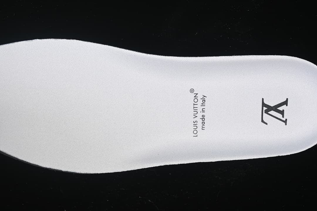 White insole printed with Louis Vuitton and made in Italy text