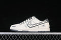 Side view of white and gray Nike SB Dunk Low shoes with black accents and printed details