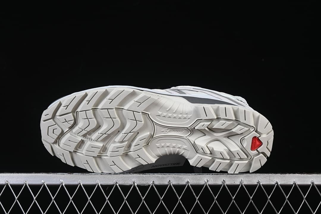 Underside view showing the shoe's patterned tread