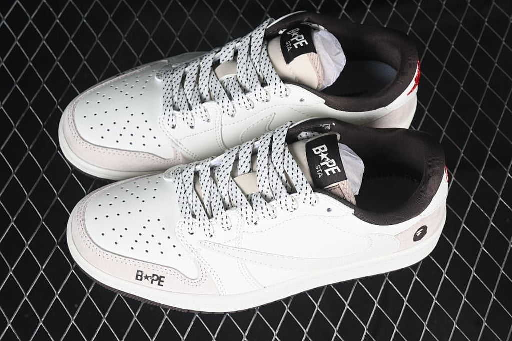 Pair of white low-top sneakers viewed from above