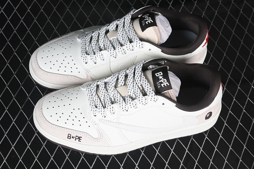 Pair of white low-top sneakers viewed from above