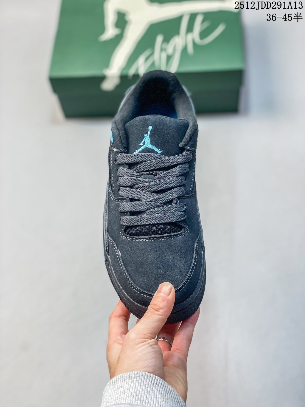 Front view of the lace-up sneaker with blue tongue logo and dark mesh panel