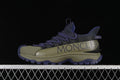 Side view of olive and purple Moncler Trailgrip Lite2 outdoor sneaker