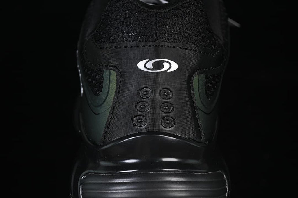 Close-up of the shoe heel and Salomon logo