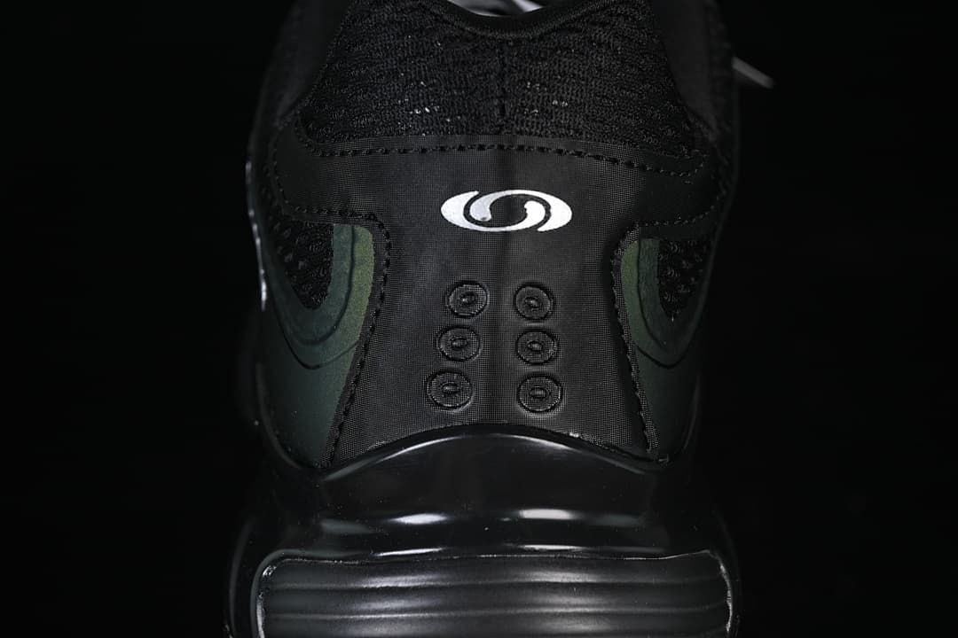 Close-up of the shoe heel and Salomon logo