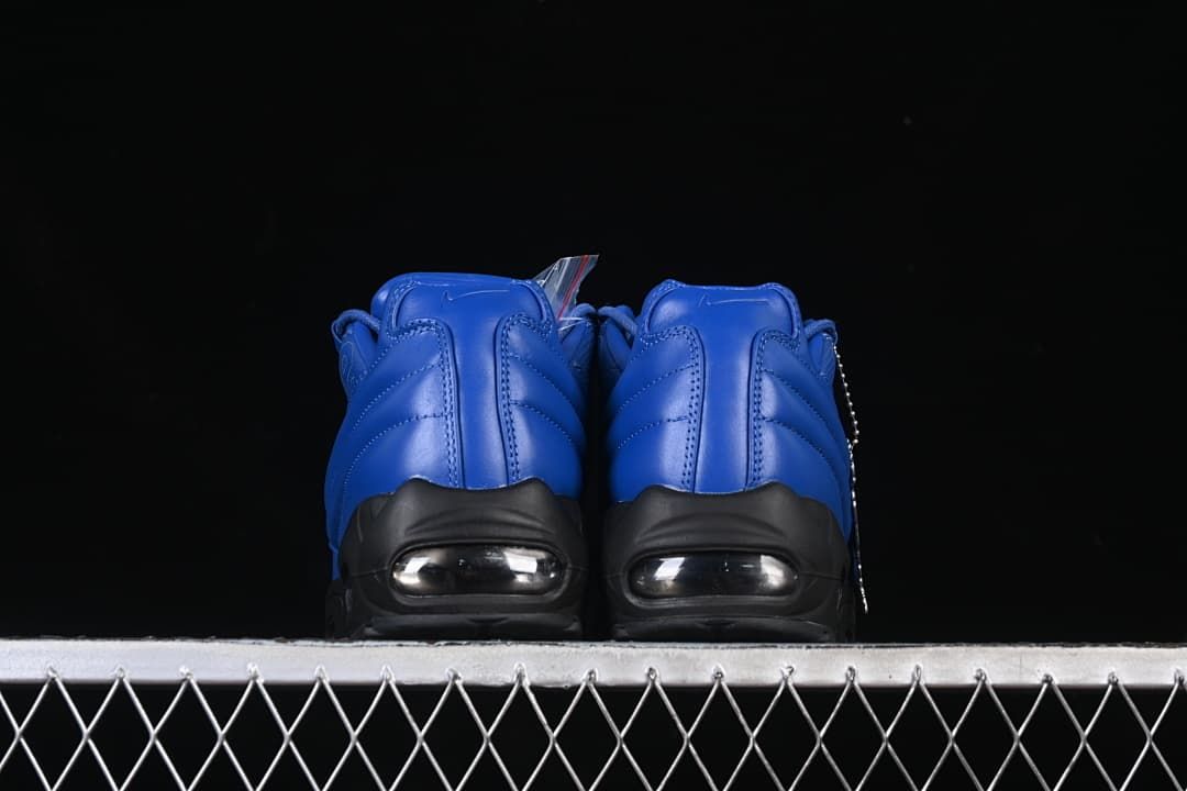 Rear view of the pair showing blue heels and visible Air units.