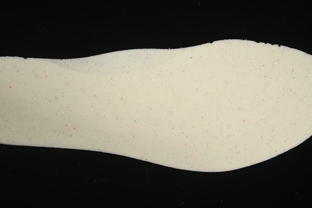 Light-colored shoe insole shown from above.