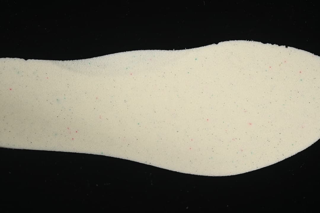 Light-colored shoe insole shown from above.