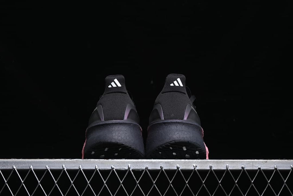 Rear view of the pair showing the heel tabs and black heel areas.