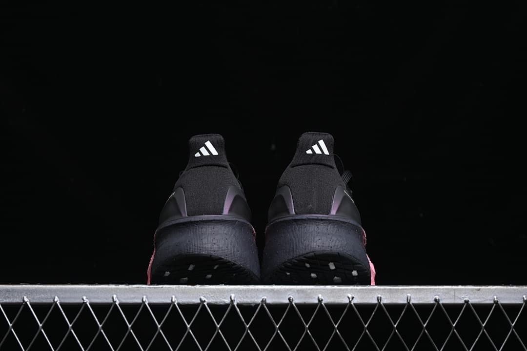 Rear view of the pair showing the heel tabs and black heel areas.