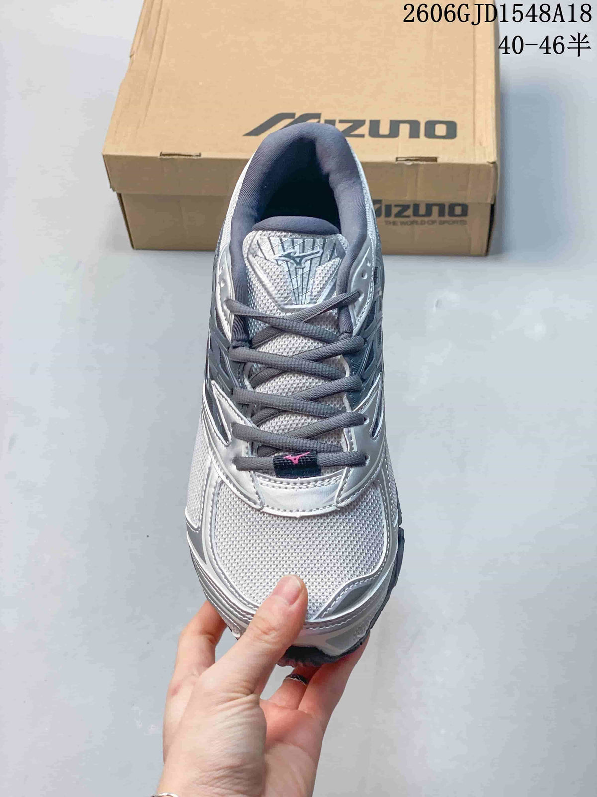 Top view of the sneaker showing its laces and mesh-look panels