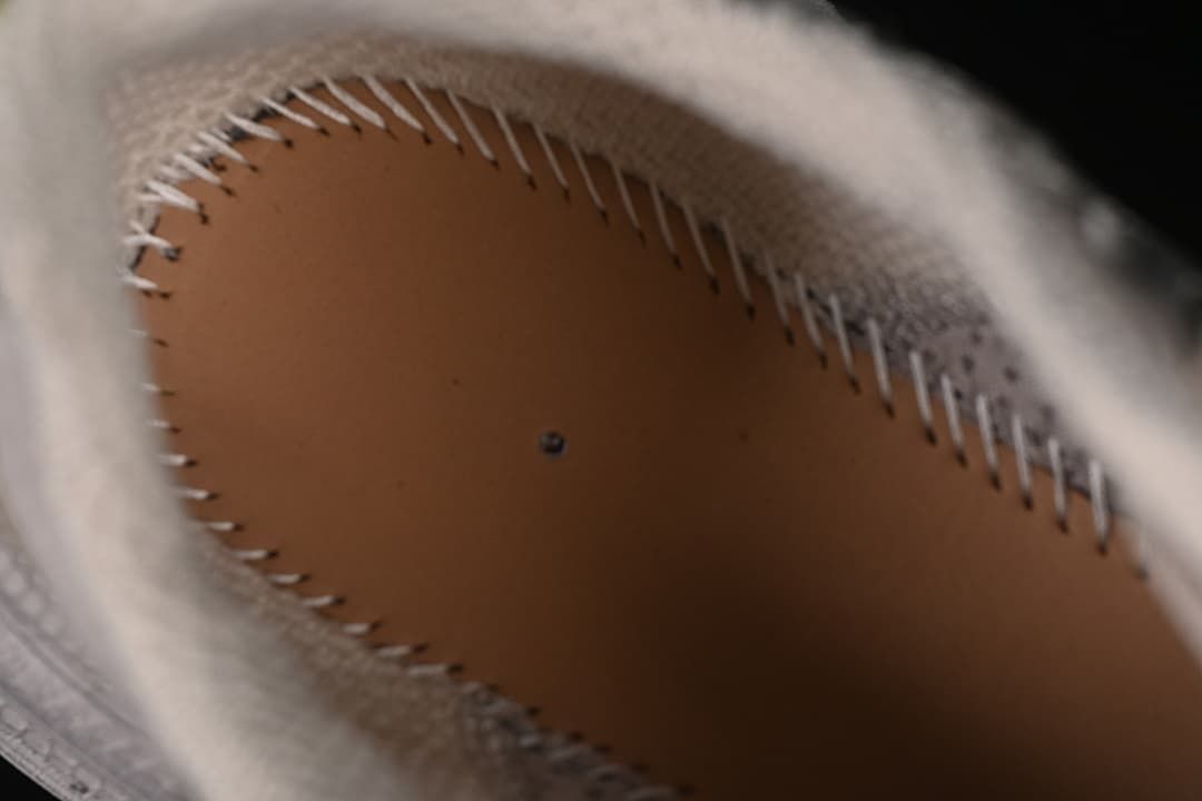 Close-up of the shoe interior and stitching