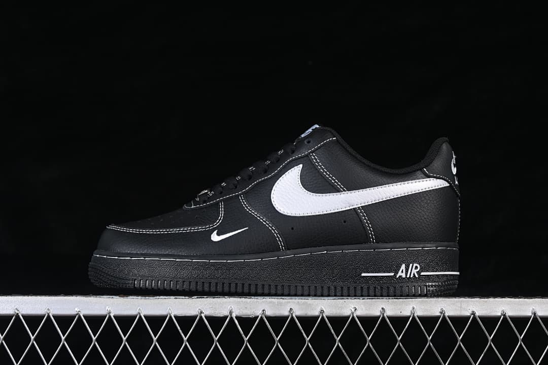 Side view of a black and white Nike Air Force 1 '07 low-top sneaker