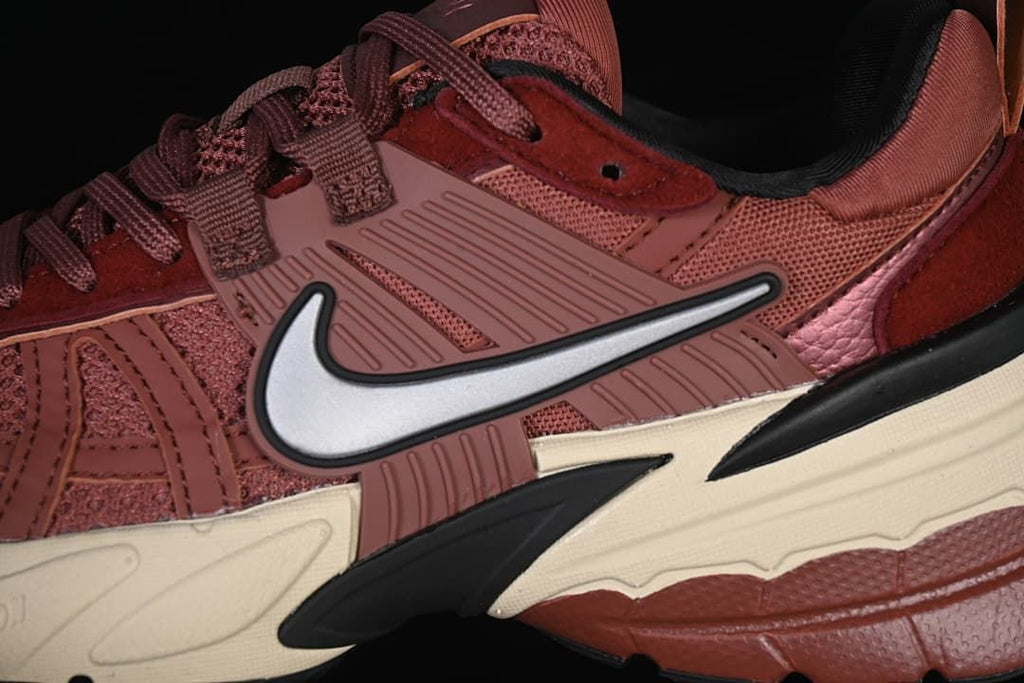Close-up of the side panel, mesh-style upper, and swoosh emblem