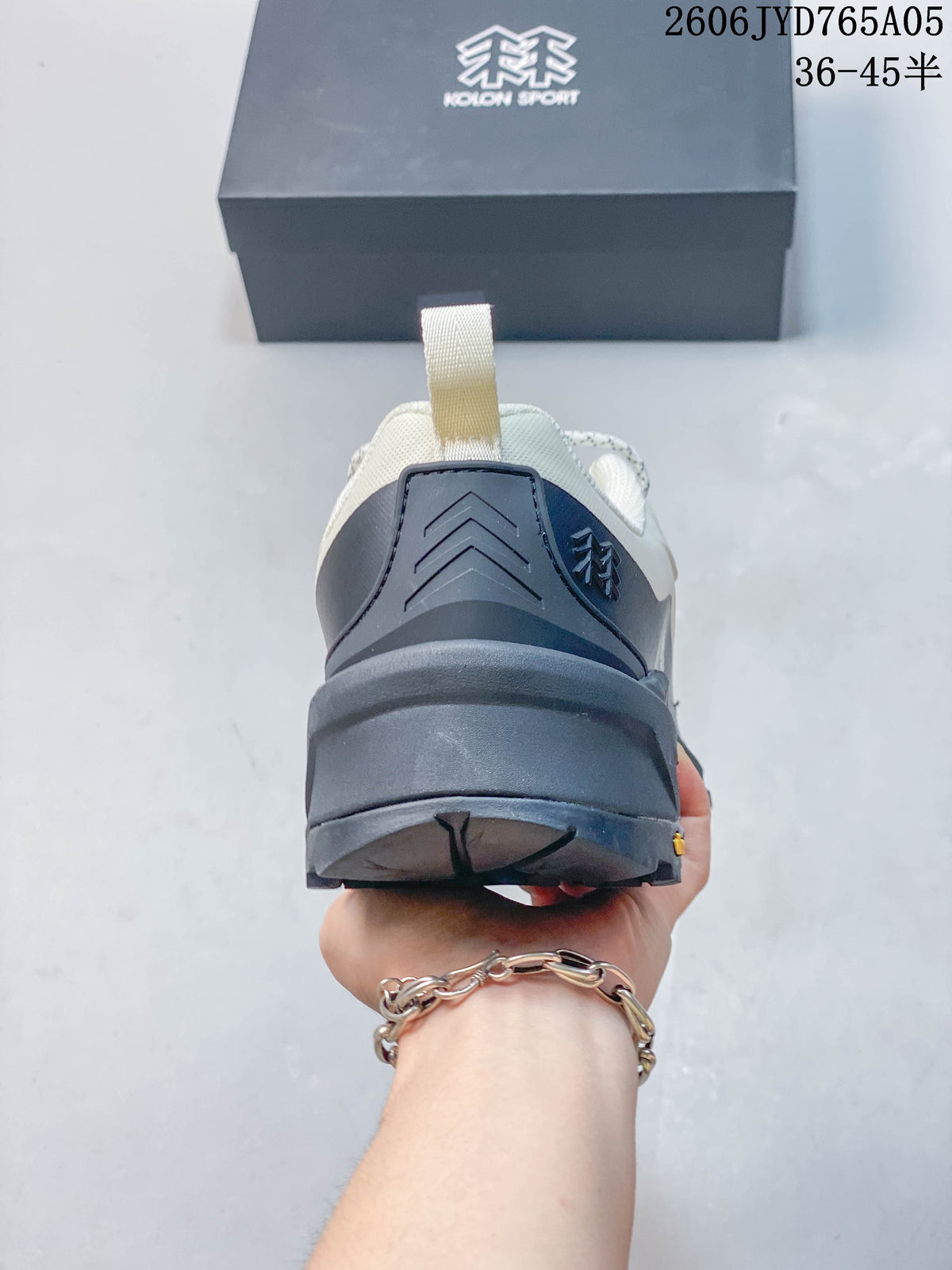 Rear view showing the heel structure, pull loop and outsole.