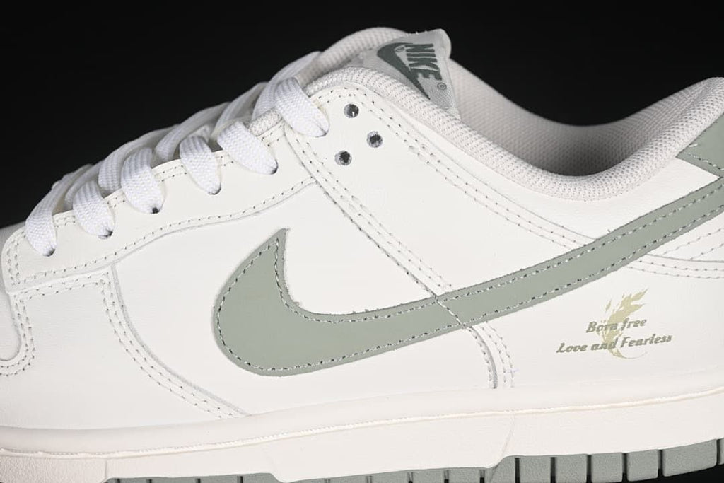 Close-up of the side Swoosh and Born Free graphic