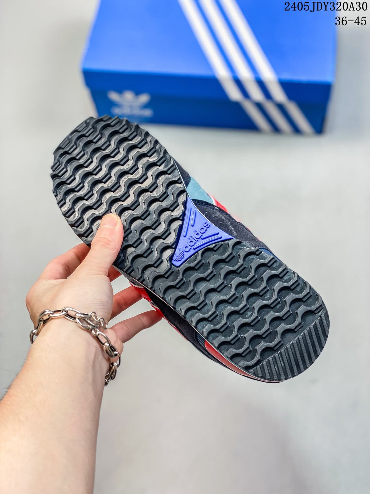 Close-up of the patterned outsole on an Adidas Originals ZX 750 sneaker.