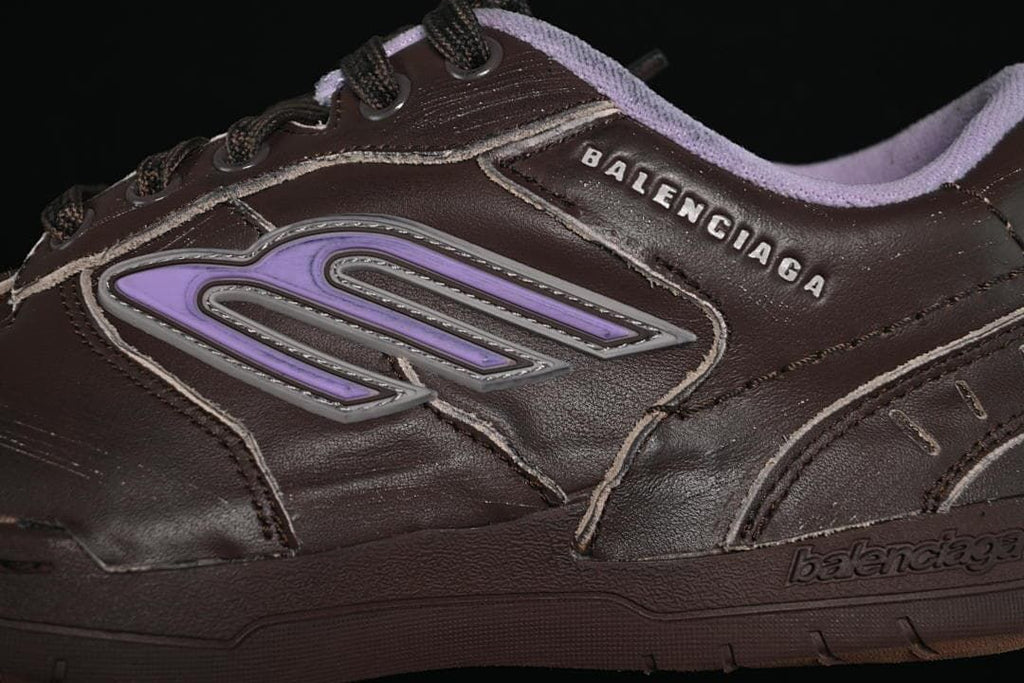 Close-up of the brown upper and lavender side accent