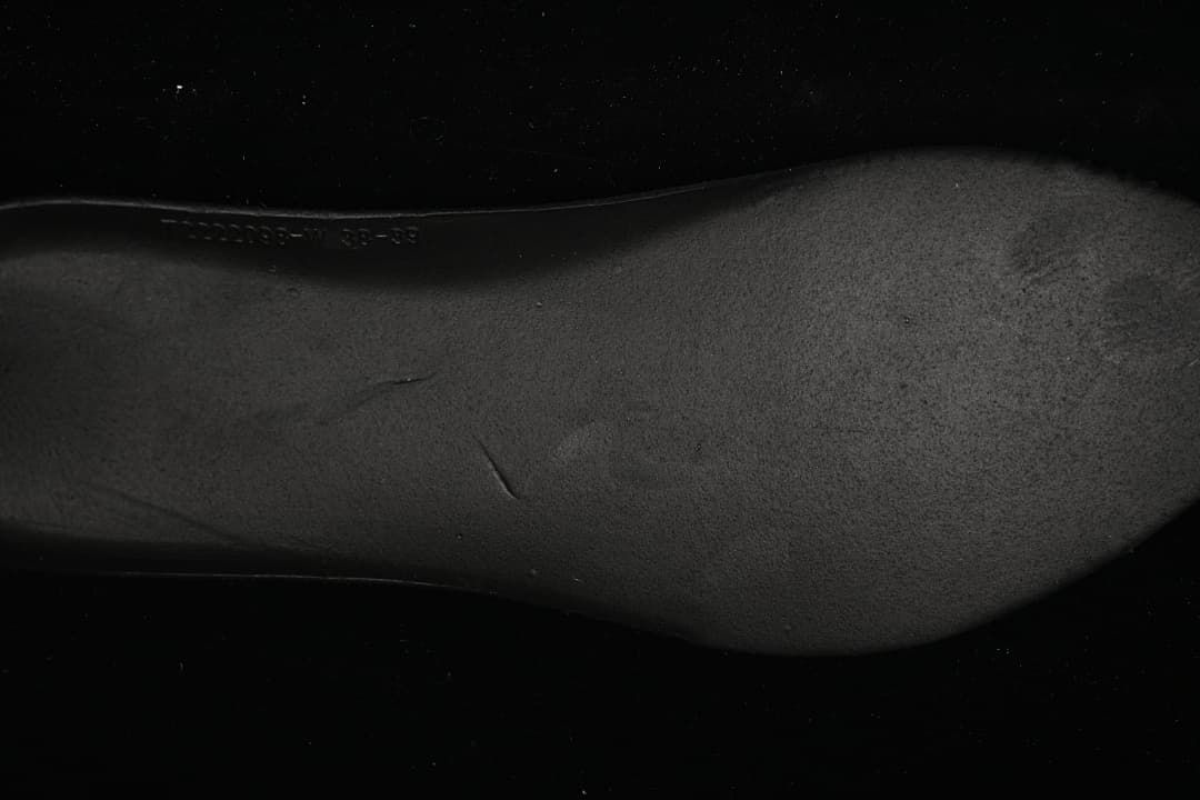 Close-up of the sneaker's dark outsole.