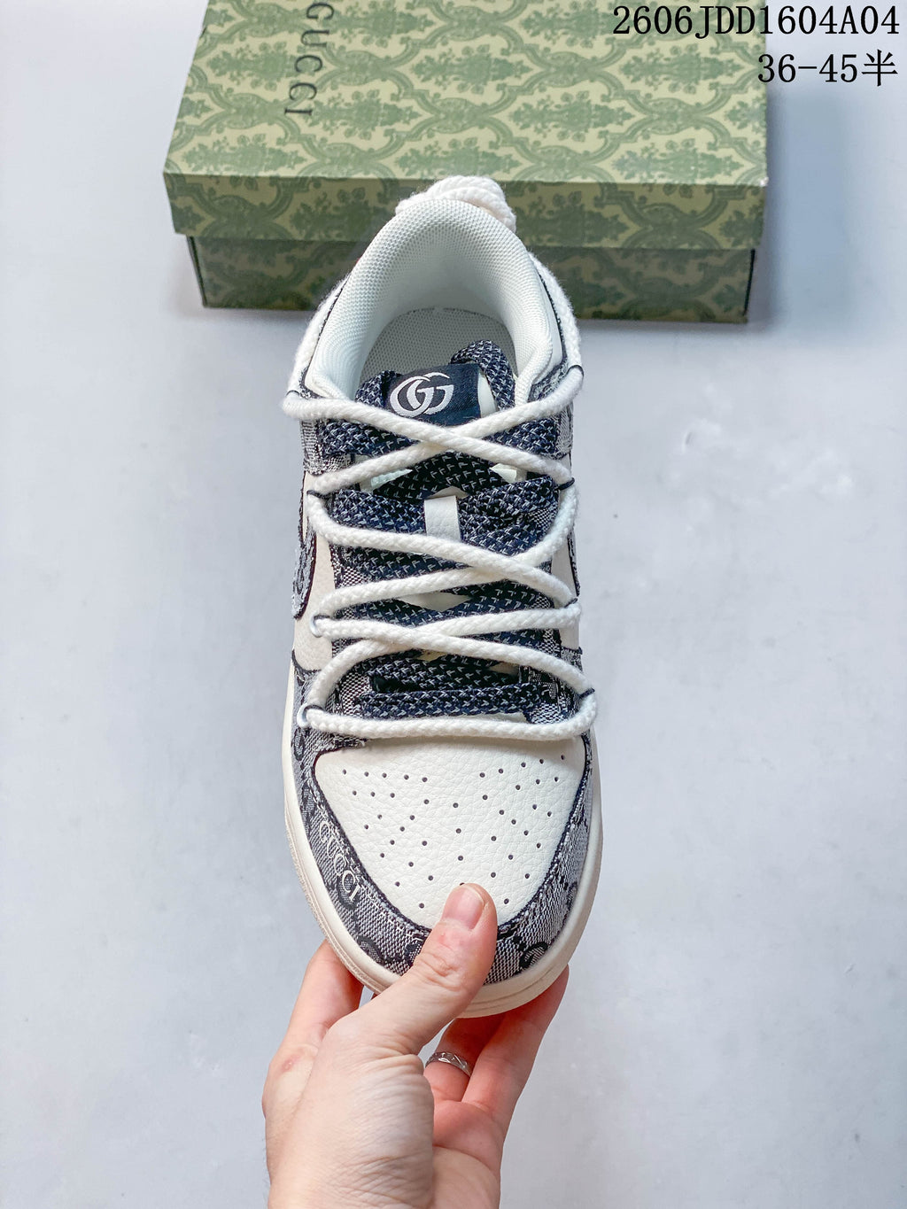 Top view of the sneaker showing its perforated toe and lace layout
