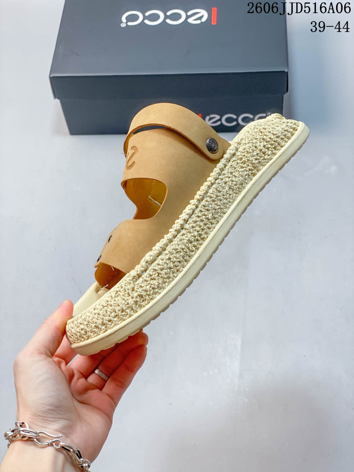 Side profile of a tan two-strap sandal with a thick textured-looking cream sole.