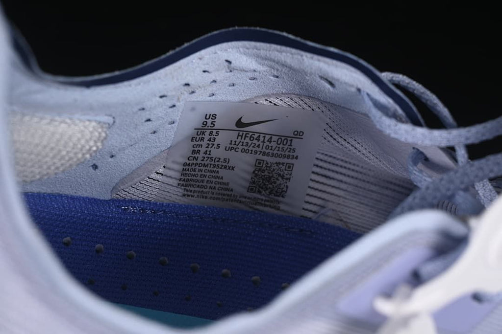 Close-up of the shoe size and style label, showing US 9.5 and EU 43