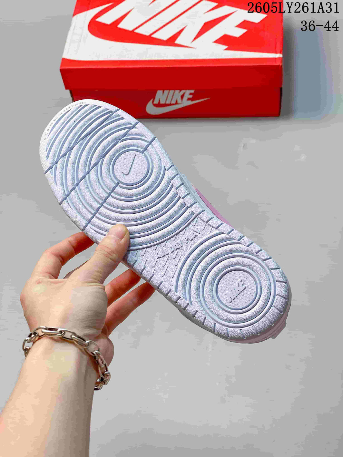 Underside of the sneaker showing a circular-patterned outsole