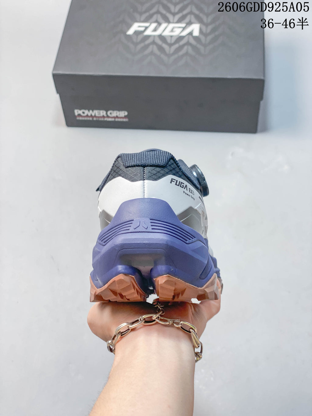 Rear view showing the purple heel structure and lugged outsole of a KAILAS FUGA EX3 shoe
