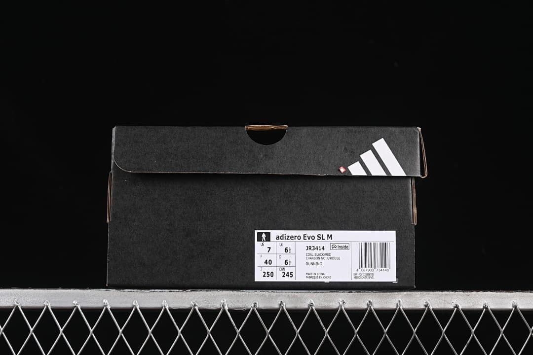 Shoe box label identifying Adizero Evo SL M and displaying size information