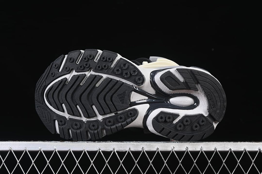 Underside view showing the patterned black outsole
