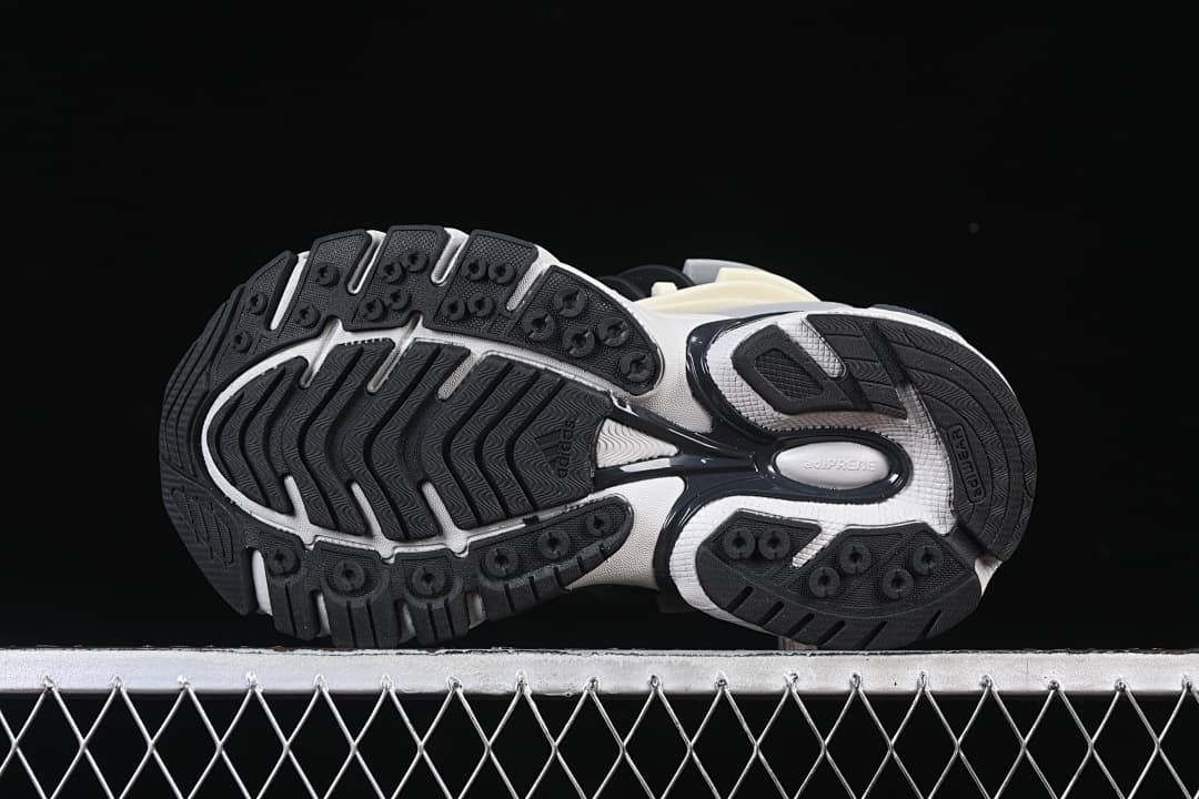 Underside view showing the patterned black outsole