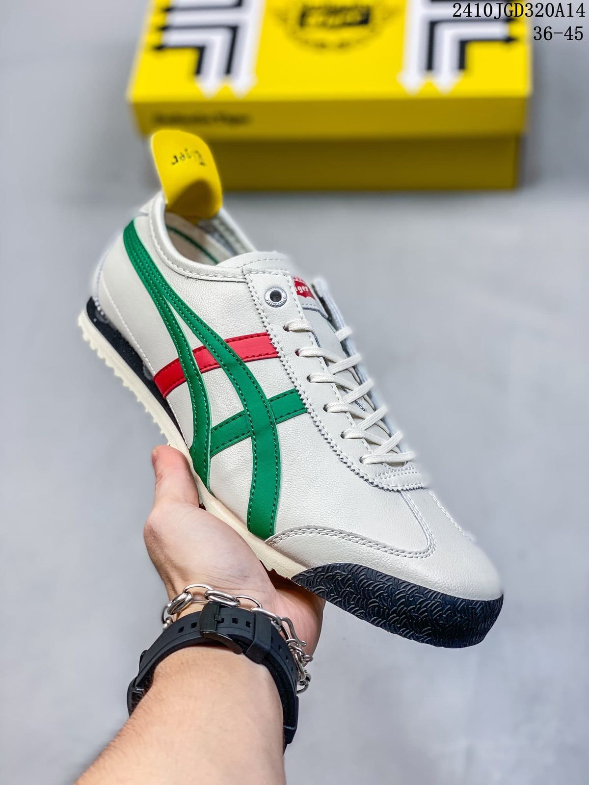 White low-top sneaker with green side stripes, red accent stripe, and dark toe outsole