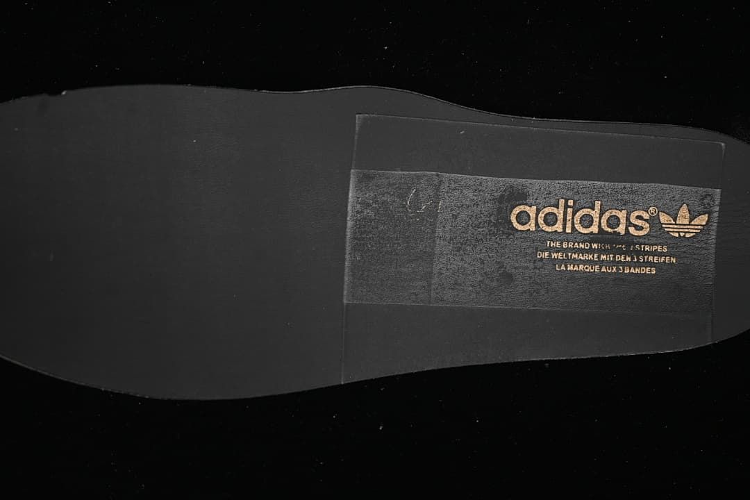 Black shoe insole with adidas Originals branding