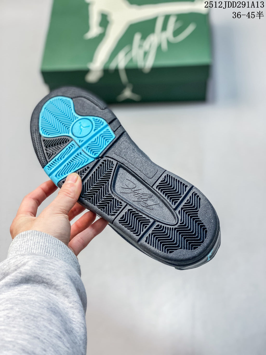 Close-up of the sneaker outsole showing dark tread and blue sections