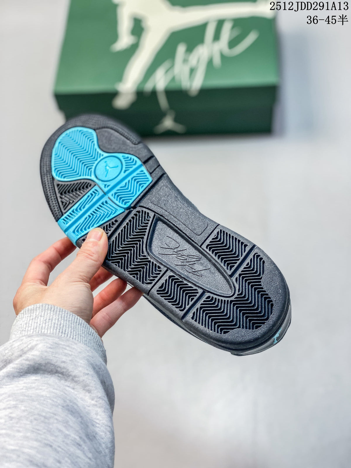 Close-up of the sneaker outsole showing dark tread and blue sections