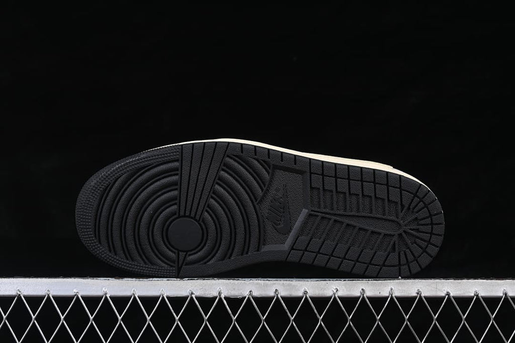 Underside view of the black rubber outsole.