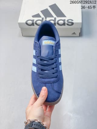 Top view of the blue lace-up sneaker showing the padded tongue and collar.