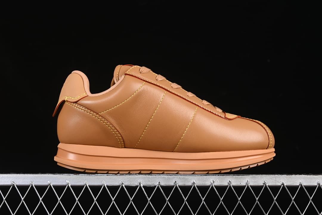 Side profile showing the low-top silhouette and layered sole