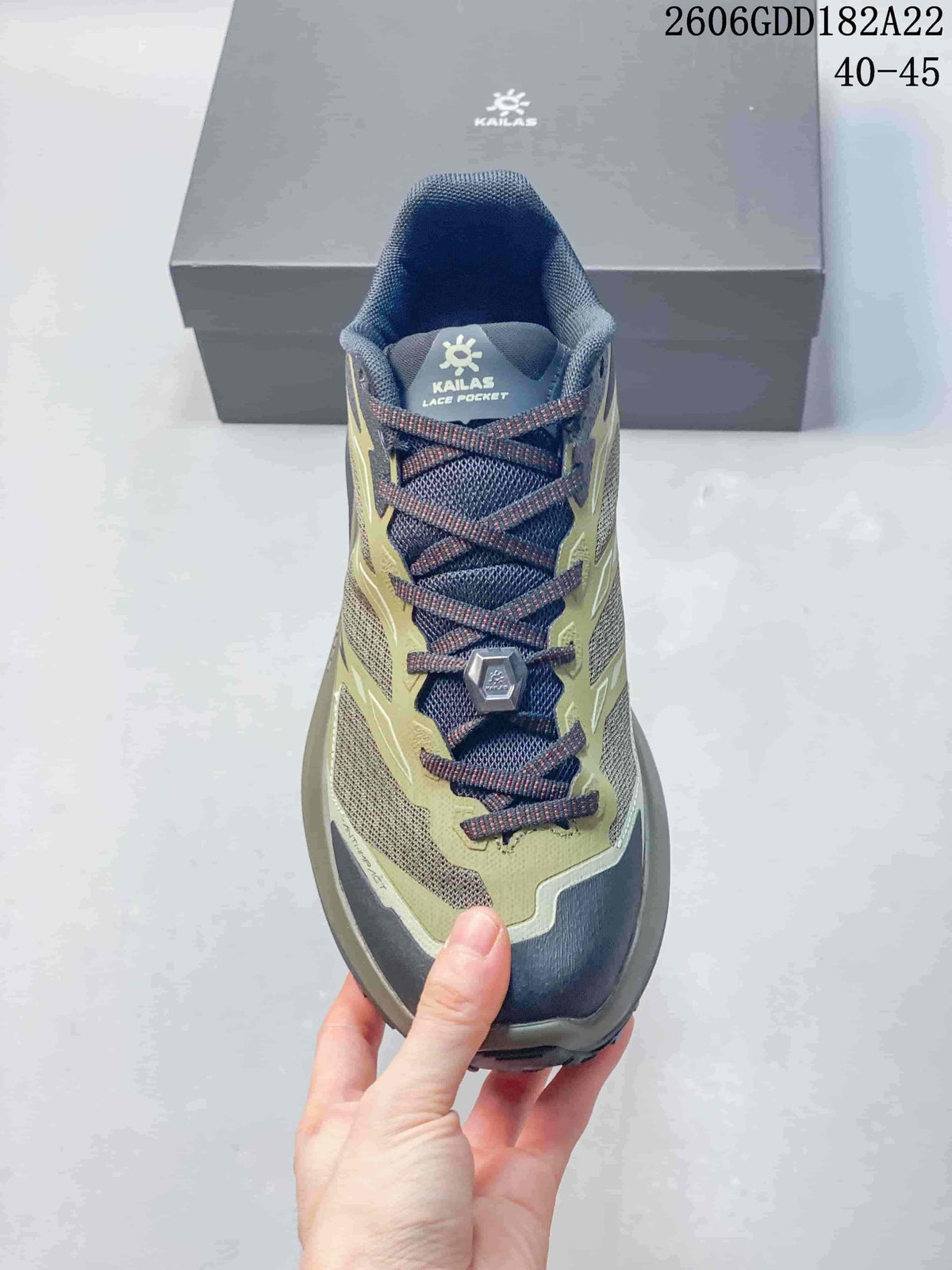 Top view of the KAILAS trail shoe showing its laces and tongue lace pocket