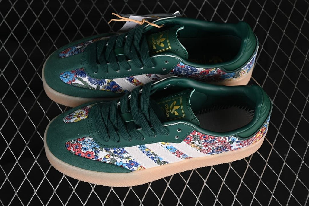 Pair of green floral-patterned Samba sneakers photographed from above.