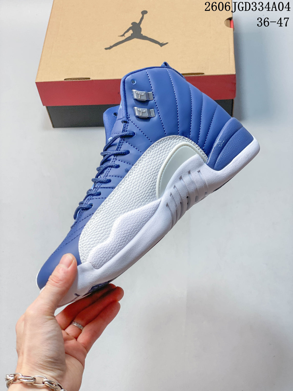 Side profile of a blue and white Jordan Air Jordan 12 high-top shoe