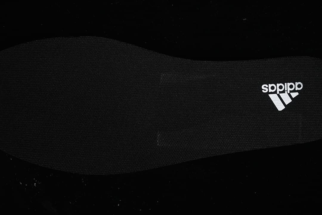 Close-up of the black insole with adidas branding