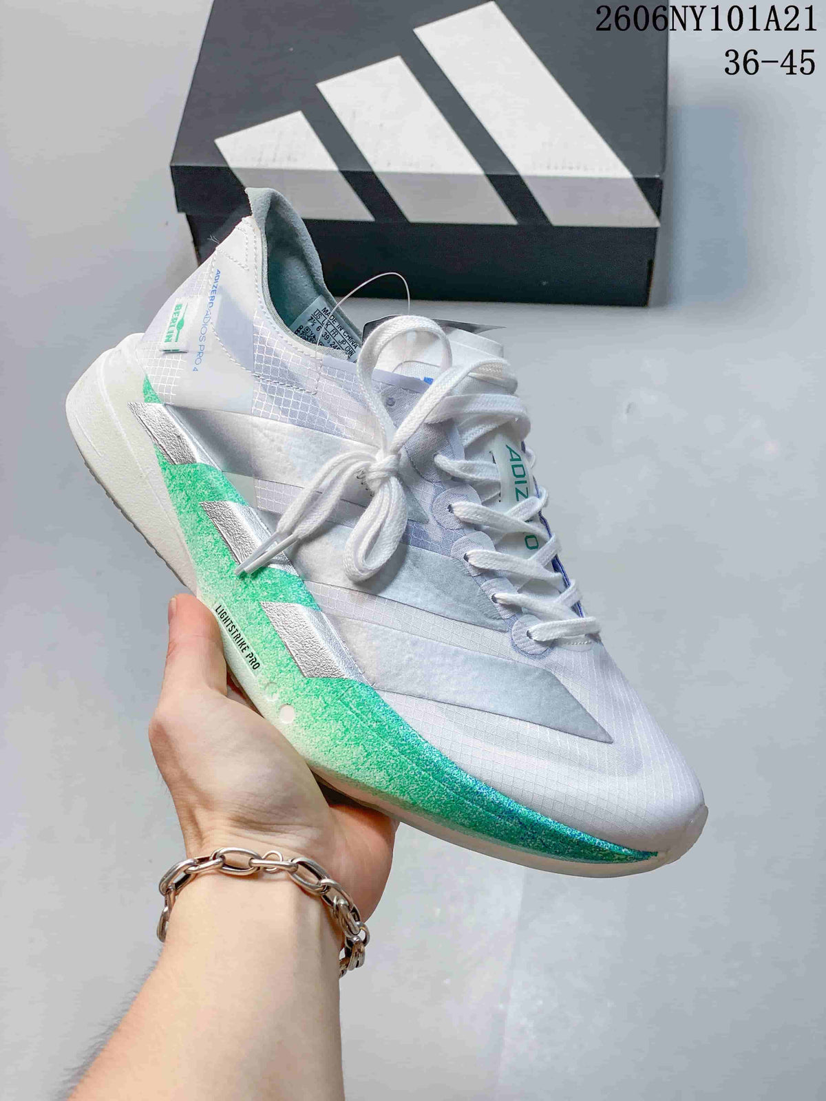 White Adidas running shoe with green and silver accents and Lightstrike Pro sole; image text shows 36–45.