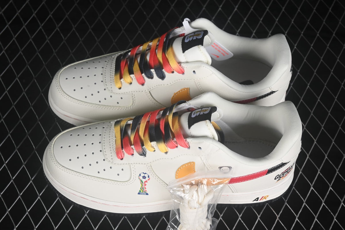 Top and side view of the pair showing multicolor laces, perforated toe panels, and an extra lace bundle.