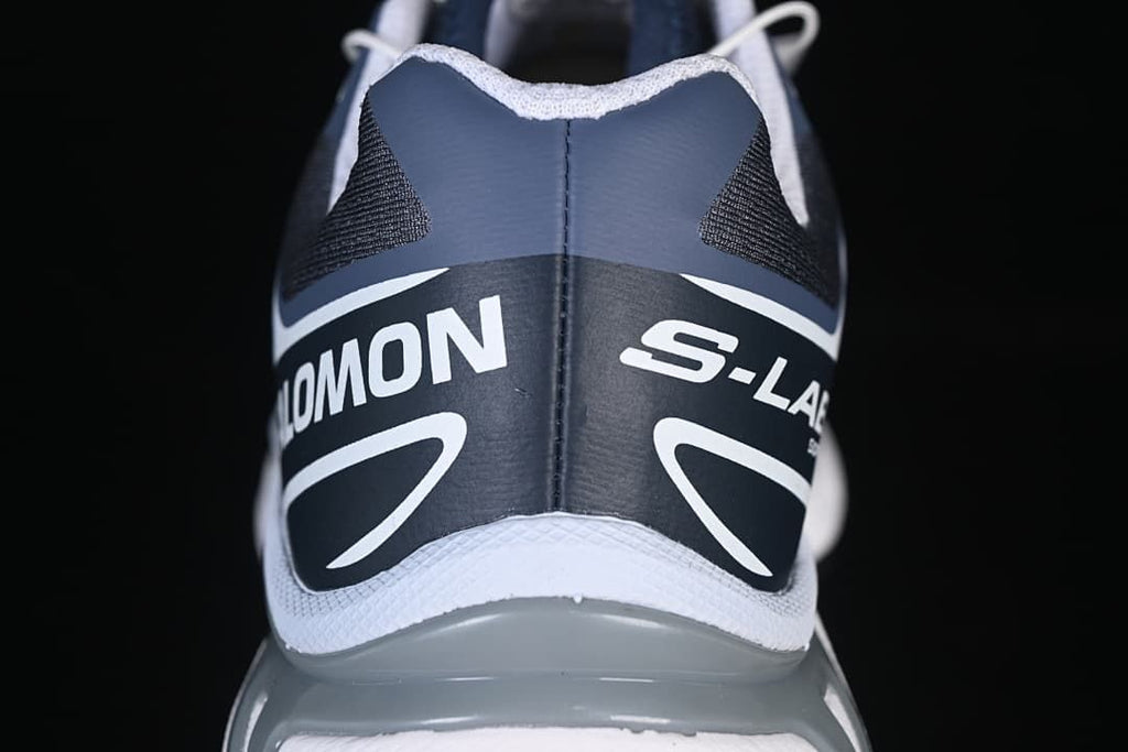 Rear view of the shoe with Salomon branding.