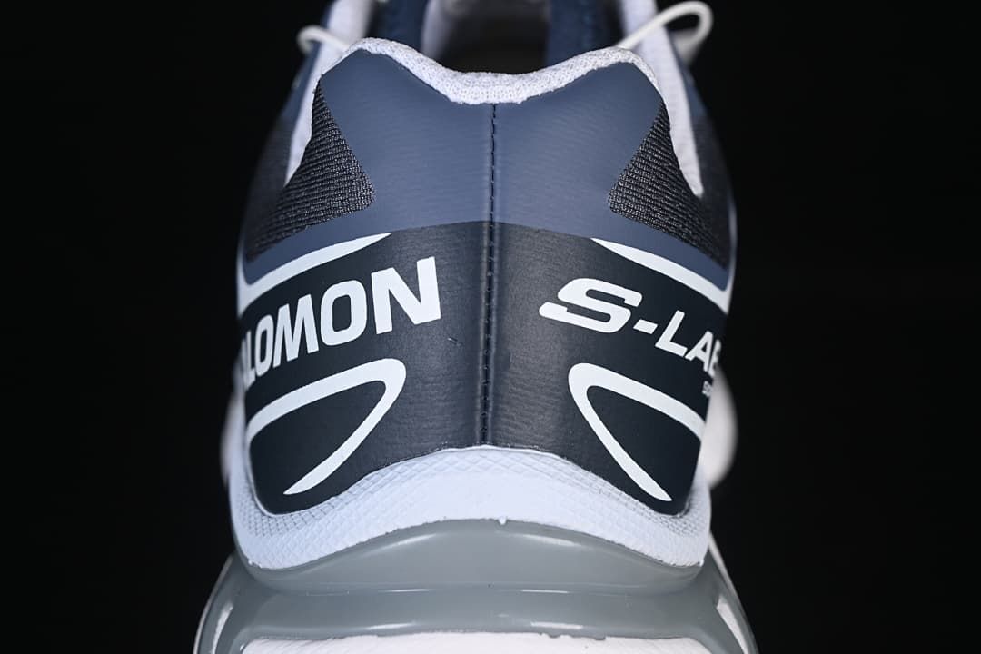 Rear view of the shoe with Salomon branding.